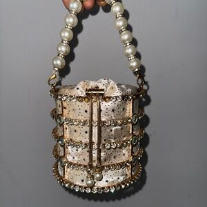 Diamonds and pearls hand clutch bag